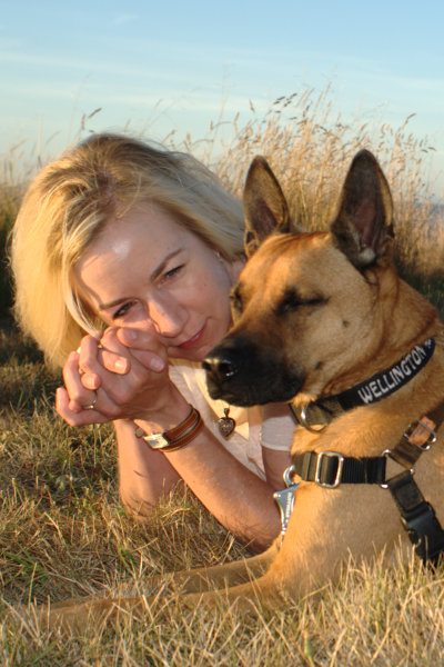 Portrait of Angela Cummings with her dog Wellington